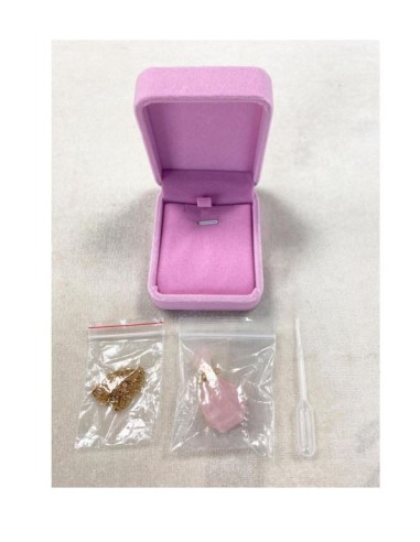 Rozenkwarts parfumflesje ketting