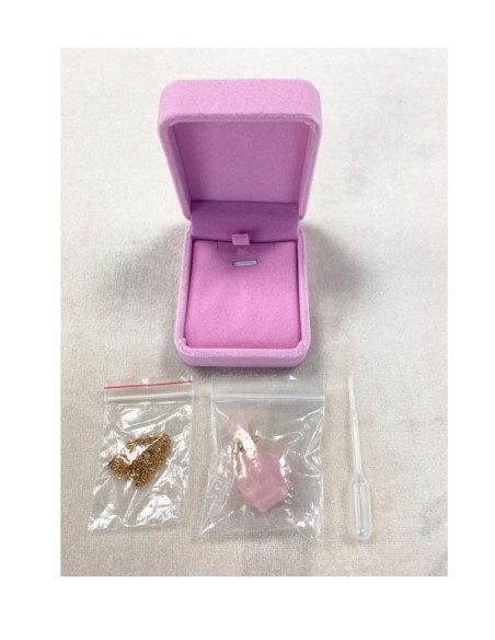 Rozenkwarts parfumflesje ketting