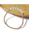 Bracelet à perles dorées et aigue-marine facettée