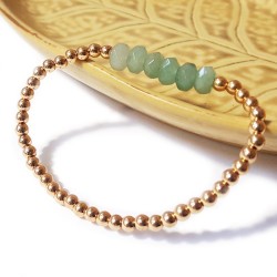 Bracelet with golden beads and faceted aventurine