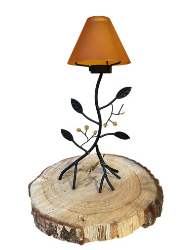 Wrought iron candleholder with leaves and orange glass